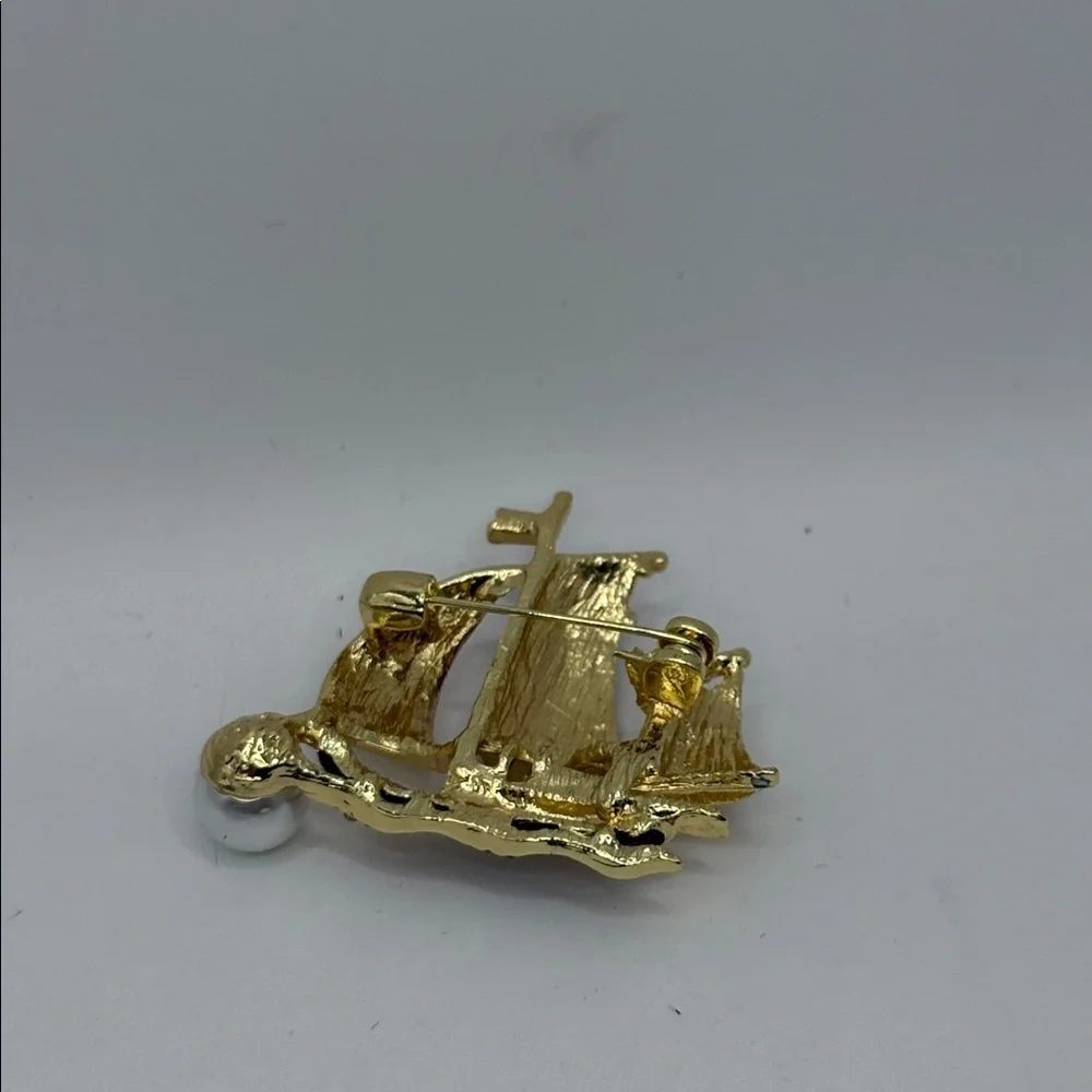 3/$25 Gold Tone and Red Sailboat Brooch with Rhinestone and Faux Pearl Accent